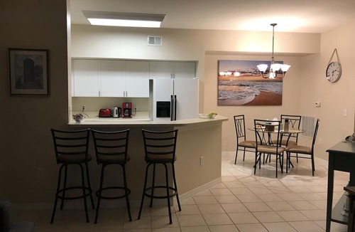 Majestic Palms Condo | Charming lake view 2/2 Florida Condo minutes away from the beach