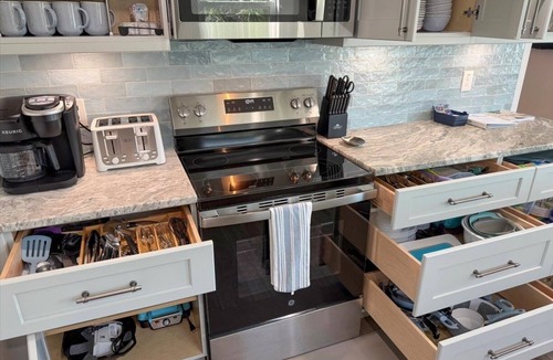 Indian Rocks Beach House | Coastal Boho: Upgraded home w/hot tubs & mini golf - steps to Indian Rocks Beach
