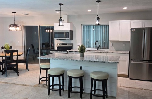 Englewood South House | Coastal Getaway - Tiki Bars and Sunset Views in Englewood
