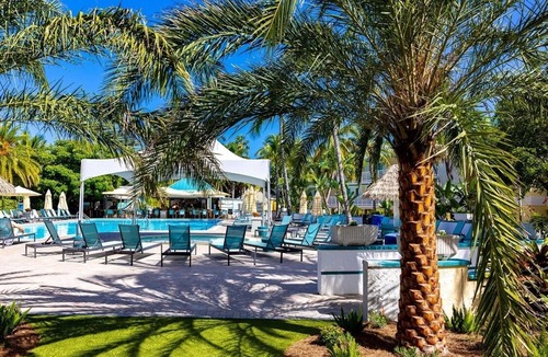 Captiva Hotel | Coastal Serenity: Courtyard Cottage w/Porch | Kitchen | Parking | Onsite Pools