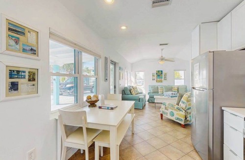 Anna Maria Cabin | Colorful beach cottage w heated private pool & grill area - dog-friendly