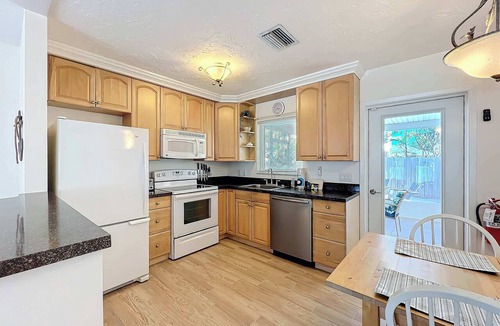 Holmes Beach Villa | Comfortable island villa with private heated pool, courtyard & easy beach access