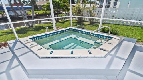 Fort Myers Villa | Coral Sunshine - large south terrace with poolspa
