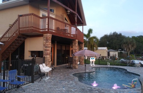 Fort Myers Shores House | Couples Retreat upstairs suite off the Caloosahtchee River with private pool