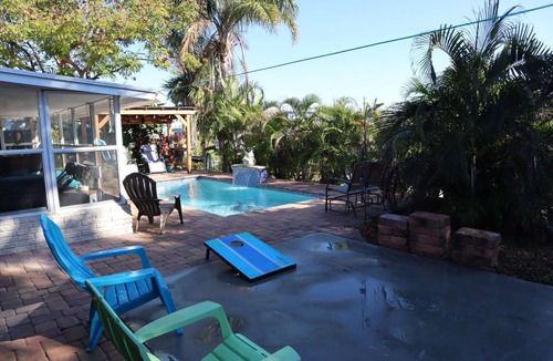 Bayshore Gardens House | Cozy canal cottage with pool, dock, Gulf access and minutes to Anna Maria Island