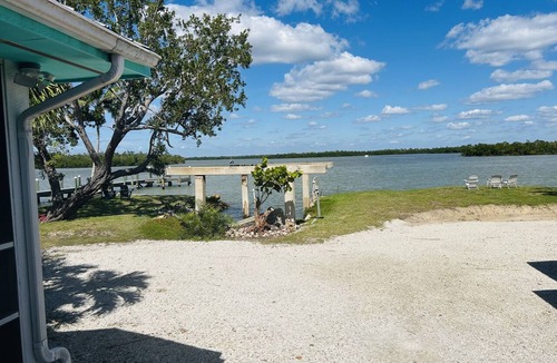 Goodland Apartment | Direct panoramic waterfront views