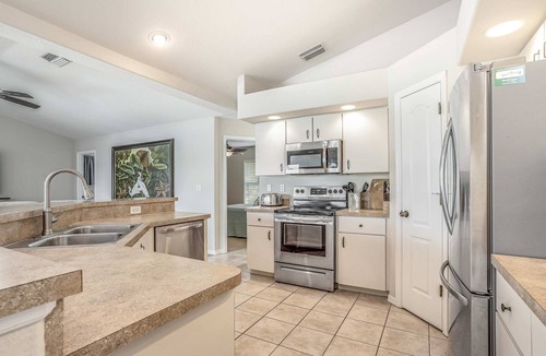 South Gulf Cove House | Dog-friendly home with private heated pool, grill, A/C, & washer/dryer