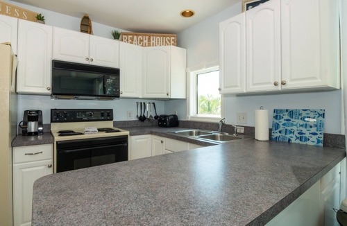 Bradenton Beach House | Dolphin Dance · Full Duplex · Sleeps 12 · 3-Night minimum.