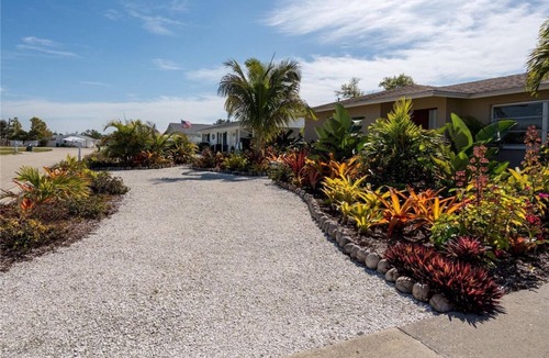 Englewood House | Escape to Paradise at Coconut Palms: Your 2 bed 2 bath Tropical Retreat Awaits!