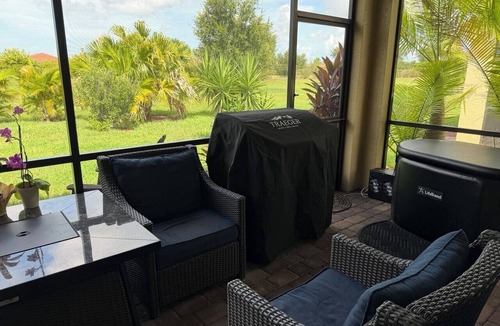 Gran Paradiso House | Gated Tuscan Paradise: 4BR/3BA Home + Lagoon Pool, Tennis & Fitness Club Access