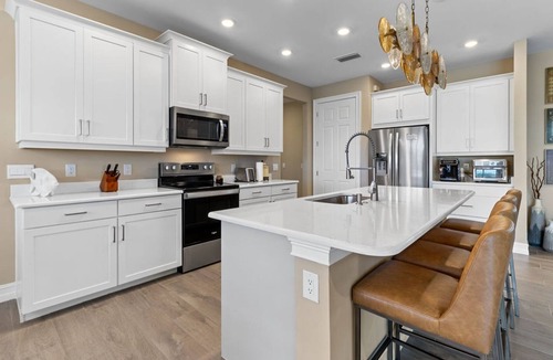 Naples House | Golf Estates gated community. Enjoy luxurious living with lake view