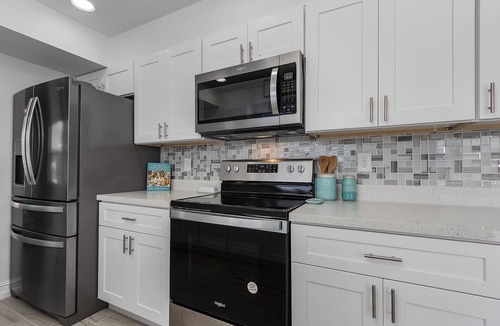 Caloosahatchee House | Gorgeous Gulf Access Home-Heated pool & garage game room!