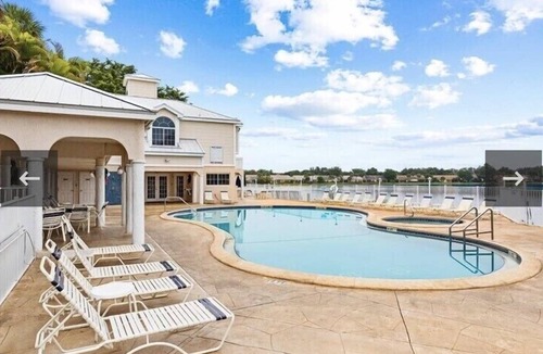 North Naples Condo | GORGEOUS - LAKEFRONT CARRIAGE HOME-1ST FLOOR LIVING-2 BED/2 BATH-2 POOLS