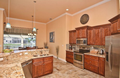 Caloosahatchee House | Gorgeous Retreat 54 ft Pool & Spa 5-Zone AC 2 Min to River 5 Min to Ft Myers