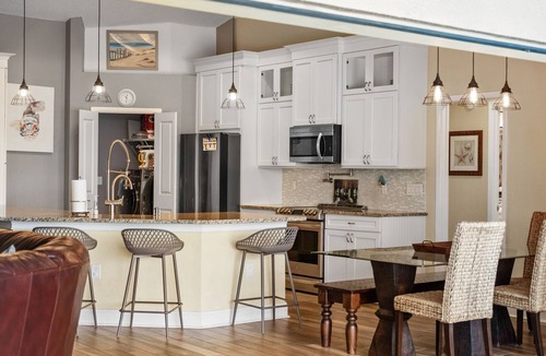 Apollo Beach House | Gray Dolphin — Waterfront Home with Heated Saltwater Pool, Dock & Kayaks