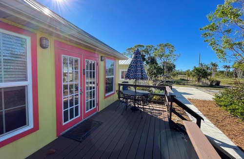 Bokeelia Cottage | Has all of the modern comforts-hidden in the palm and mango groves.