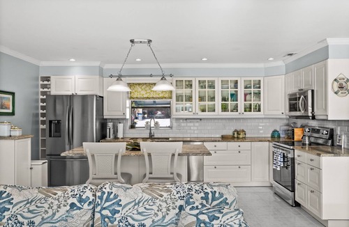 Saint James City House | 🌴Heated Salt Water Pool - Waterfront - Pool Table. 2420 Sapodilla Ln | St James City | 2 Bedroom 2 Bath. Welcome to your private slice of paradise—where laid-back island charm meets elevated coastal comfort.