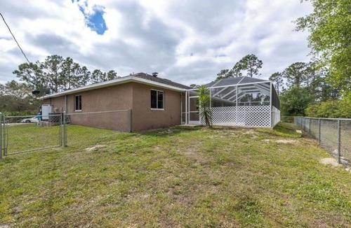 Lehigh Acres House | Its a beautiful house for your vacation with pool and screen enclosure.