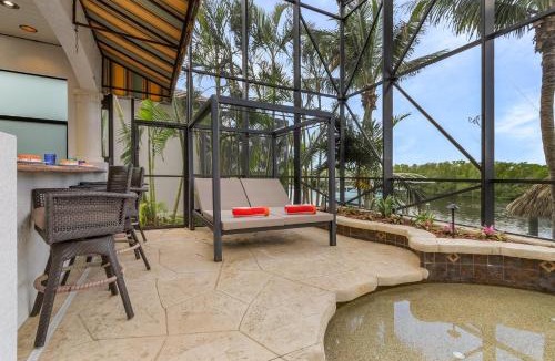 Pelican House | JUST WOW! Experience Luxury! Gulf Access, Pool & Spa, Dock, Tiki- Villa Waterfront Wonderland