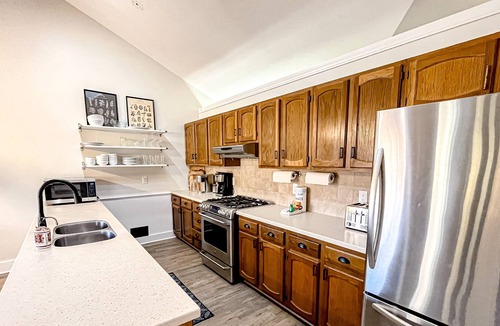 Brevard House | Lakefront home with views, dock, kayaks, outdoor pool & tennis - dog-friendly
