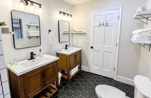 Brevard House | Lakefront home with views, dock, kayaks, outdoor pool & tennis - dog-friendly