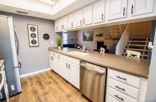 Saddlebrook Condo | Lakeview Townhome Retreat | Workspaces & Patio | Optional Saddlebrook Resort Amenities