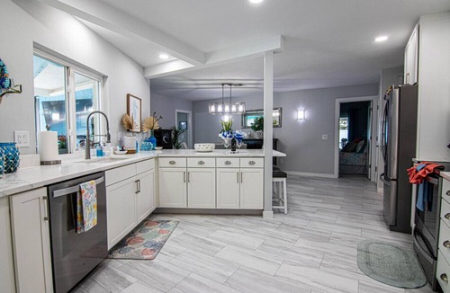 Lochmoor Waterway Estates House | `Latitude Adjustment` with Heated Pool and Boat Dock