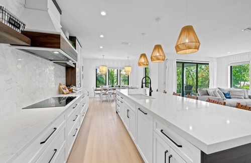 Sarasota House | Lido Key Family Home with Waterslide & Rooftop Views Steps to Beach -Vitamin Sea