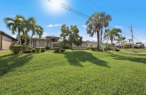 Pelican House | Lovely Home with Canal View, Heated Pool, Boatlift, Stunning Sunsets