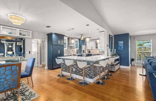 Saint James City House | Luxurious waterfront home, pool, boat dock, fillet station, private guest suite