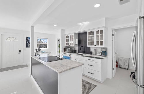 Fort Myers House | Luxury family friendly WATERFRONT home with a POOL, PLAYGROUND, FIREPIT & BEACH