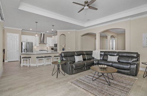 Biggar House | Luxury Lakefront 4-Bedroom Home with Private Pool and Resort Amenities in Estero