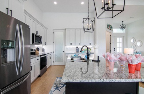 Pelican House | Luxury Waterfront 4BR Home w/Pool & Hot Tub