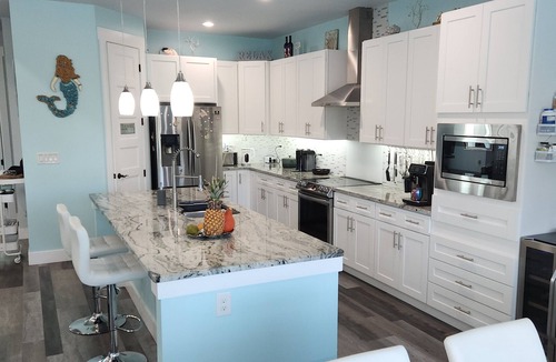 Long Meadow Villa | Modern luxury meets Florida living in Rotonda — heated saltwater pool included!