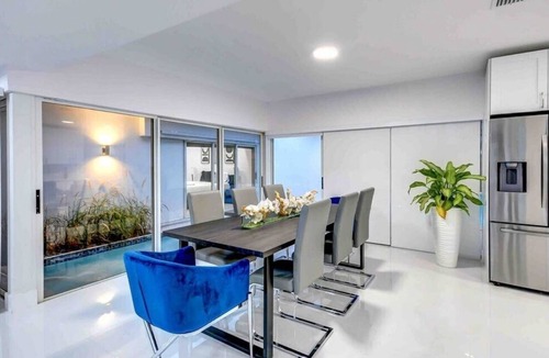 Cutler Bay House | Modern Retreat Game Room, Playground & Pool BBQ