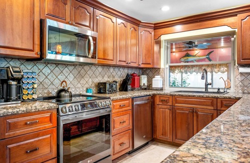 Palm River Estates House | Naples Retreat, Game Room + Pool, Table & Darts, Fenced Yard, Pet Friendly