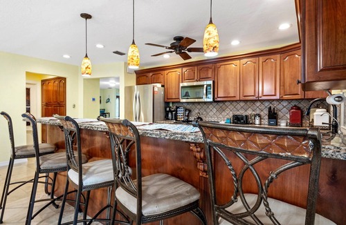 Palm River Estates House | Naples Retreat, Game Room + Pool, Table & Darts, Fenced Yard, Pet Friendly