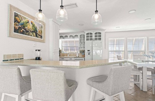Whitney Beach House | NEW Canal Family Home - Pool, Kayaks, Dock & Game Room