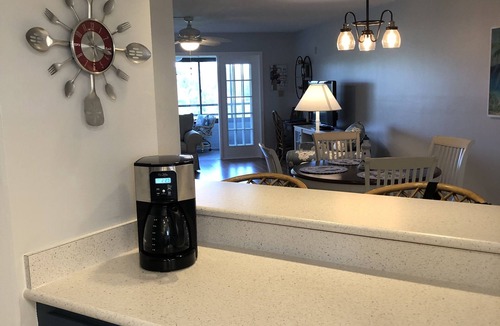 Burnt Store Marina Condo | On the 5th hole, walk in shower, new appliances, restaurants, heated pool.