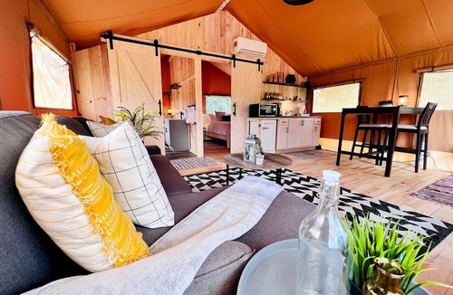 Punta Gorda RV Rental | Outstanding Safari Tent with Jacuzzi and and Beautiful Outdoor and Indoor Living in Florida
