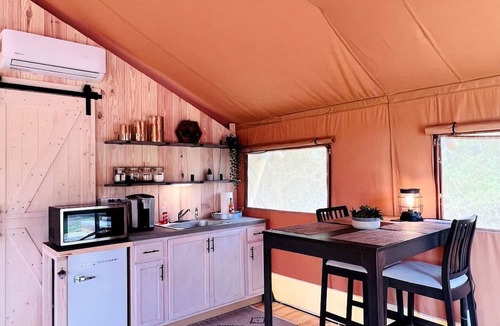 Punta Gorda RV Rental | Outstanding Safari Tent with Jacuzzi and and Beautiful Outdoor and Indoor Living in Florida