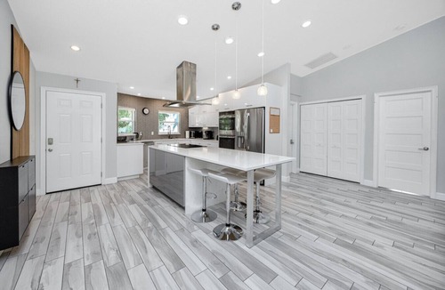 Palm Harbor House | Palm Harbor Hideaway | Gorgeous Home w/Heated Pool, Hot Tub & Tropical Oasis