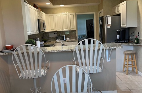 Naples House | Paradise Awaits! Country Club Living, Private Golf Course, beaches, 1st Floor!