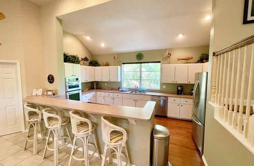 Jose's Hideaway House | Parrothead's Paradise - 4 BR House - Private Boat Dock & New Heated Pool