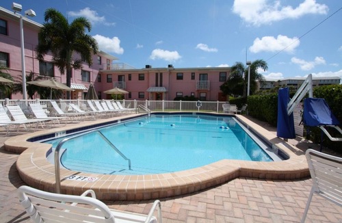 St. Pete Beach Condo | Patio Area - Walk to Beaches Shops & Restaurants