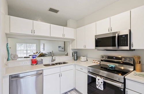 Sabal Harbour House | Peaceful Lakeside Stay with Private Screened Patio-Community Pool-Near Beaches