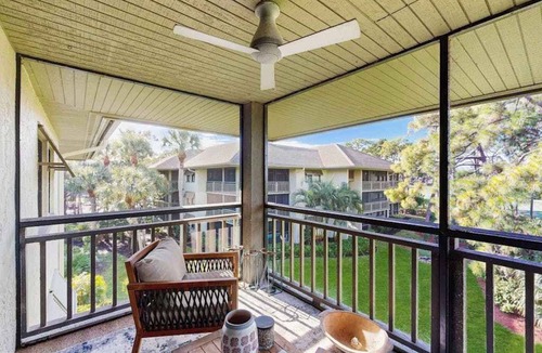 Bonita Bay Condo | Peaceful top floor condo with golf views and resort amenities
