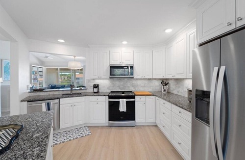 Pelican Bay House | PELICAN BAY. Charming 3-bedroom townhome in exclusive Pelican Bay community.