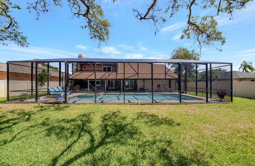 Palma Sola House | Private Pool 4 bd 3 ba with 2 King Master Suites Sleep 10 near AMI and IMG