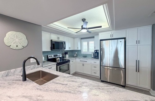 Punta Rassa Condo | Punta Rassa 4-502: Beautiful waterfront views just steps away from a private fishing pier.